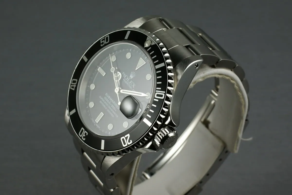 Rolex Submariner 16610 Box and Papers A serial